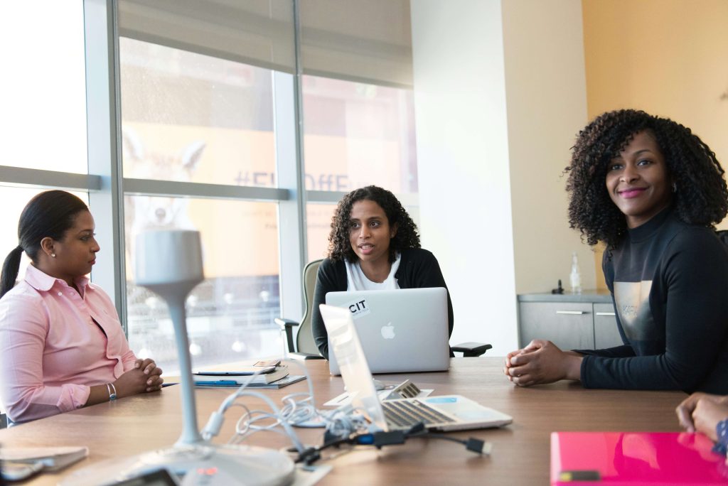 Group of smiling working black females